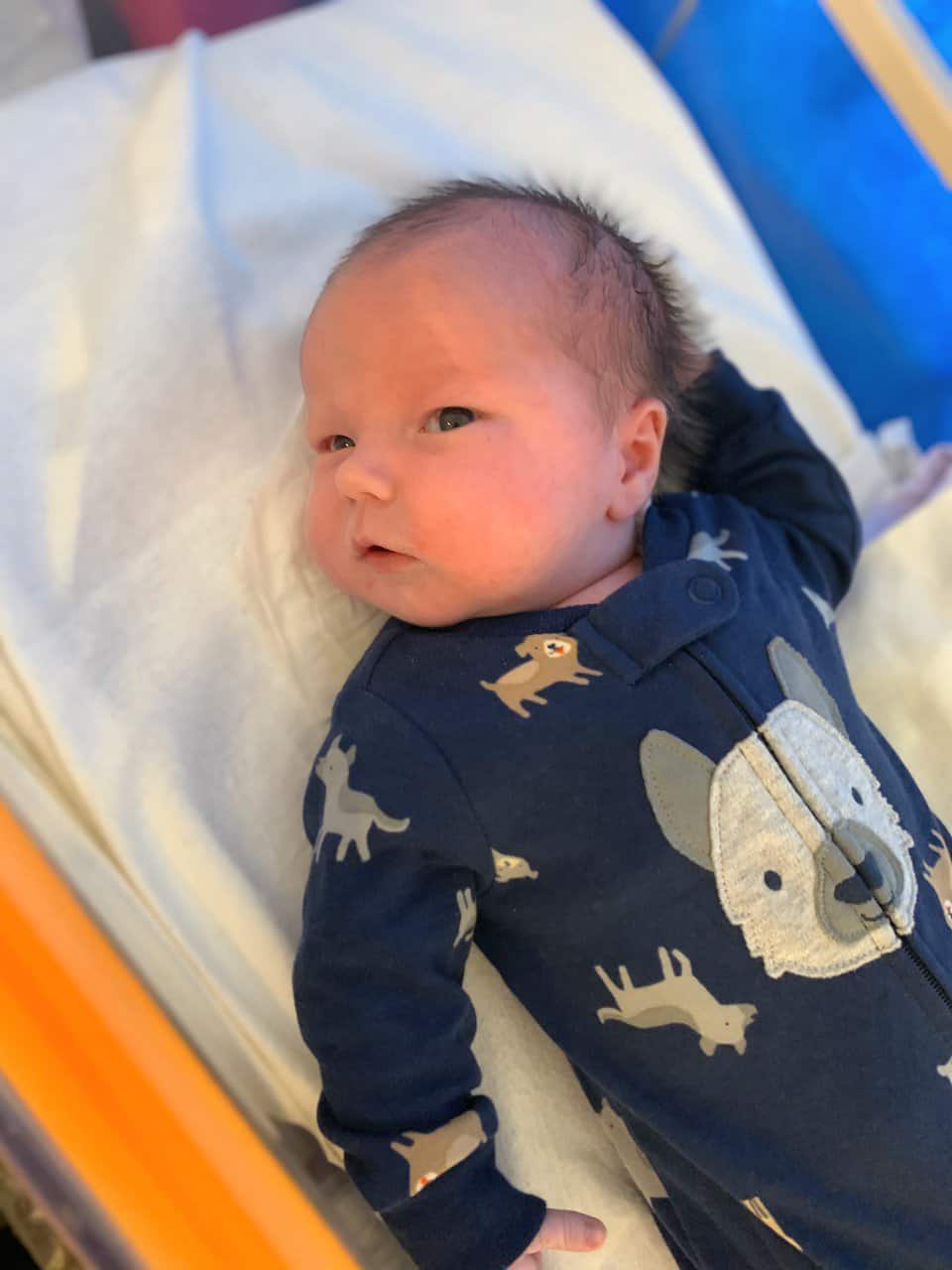 Newborn zipper sleep suit. Baby essentials.