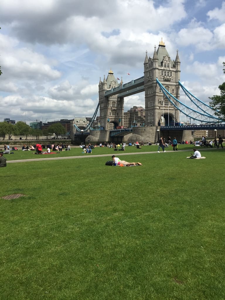 View of Tower Bridge, London across the green